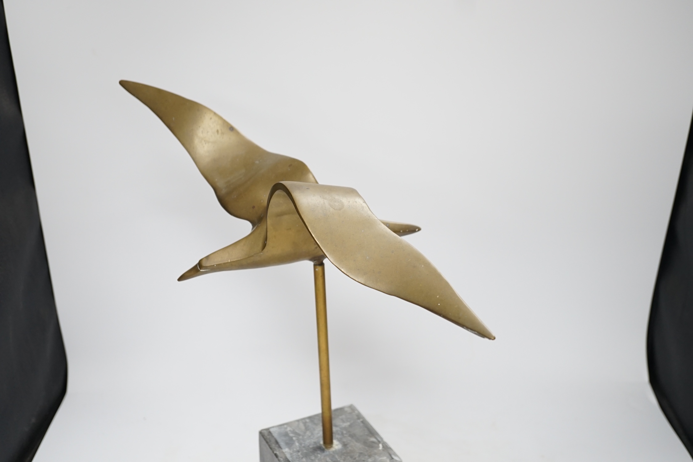 An abstract bronze seagull on marble stand 46cm high